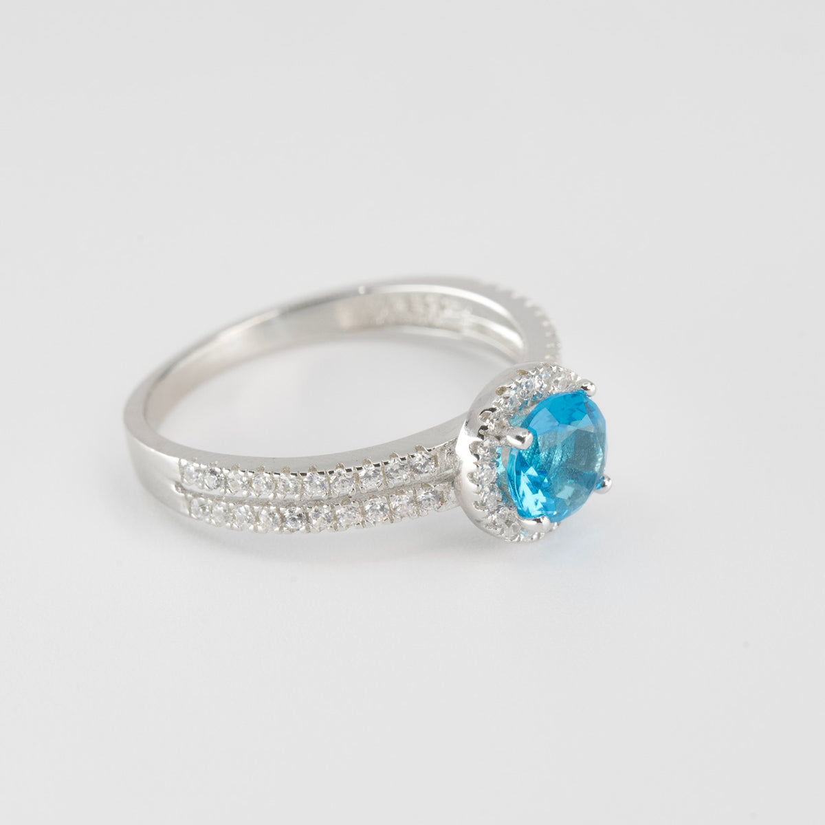 Silver Halo Ring with Blue Topaz Aqua marine Center and Pavé Accents (2)