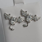 Silver Ear Climber Earrings with Oval moissanite and Pavé Wings (2)