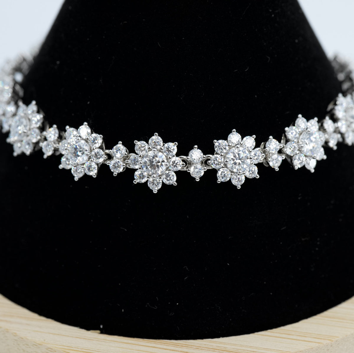 Floral Cluster Moissanite Tennis Bracelet in Silver