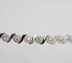 Silver Swirl Tennis Bracelet with Moissanite Clusters (2)