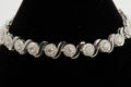 Silver Swirl Tennis Bracelet with Moissanite Clusters